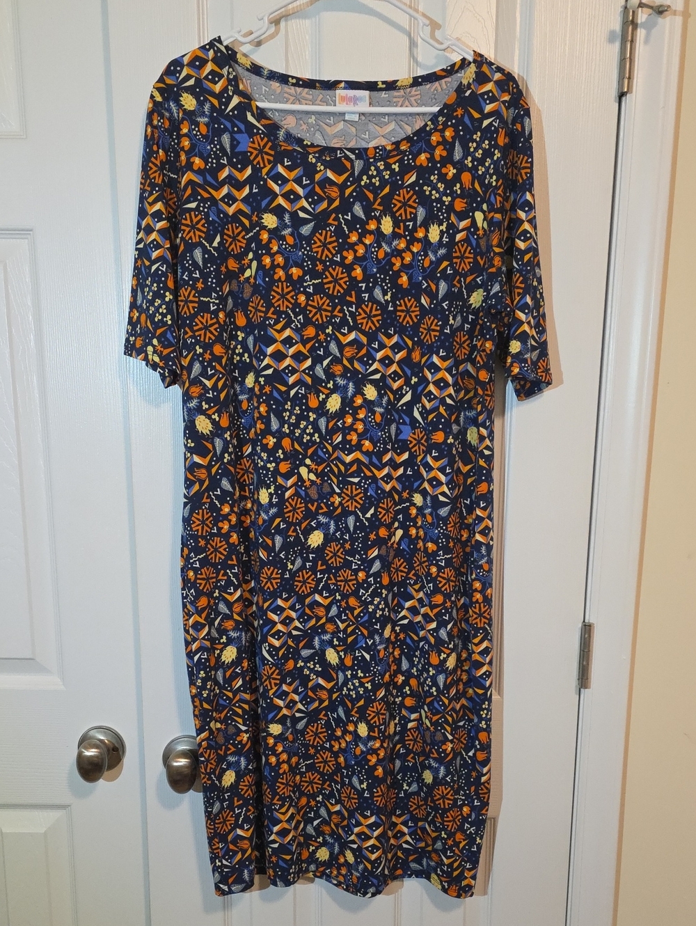 LuLaRoe Navy Blue Tee Dress with Orange and Yellow Accents